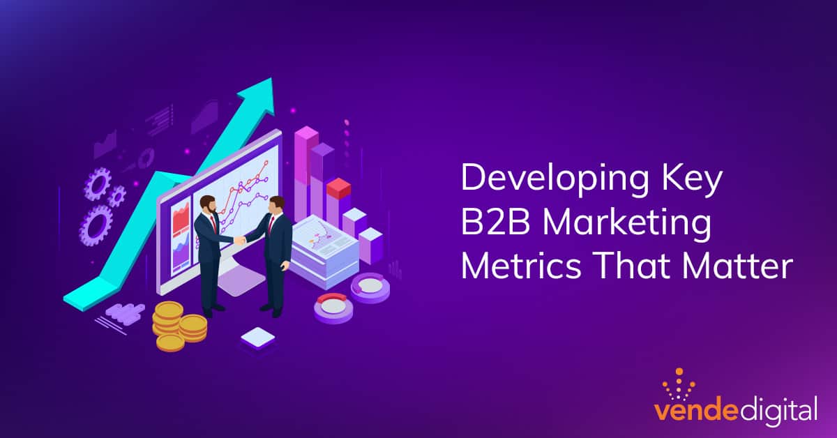 businessmen shaking hands over analytics | b2b marketing metrics